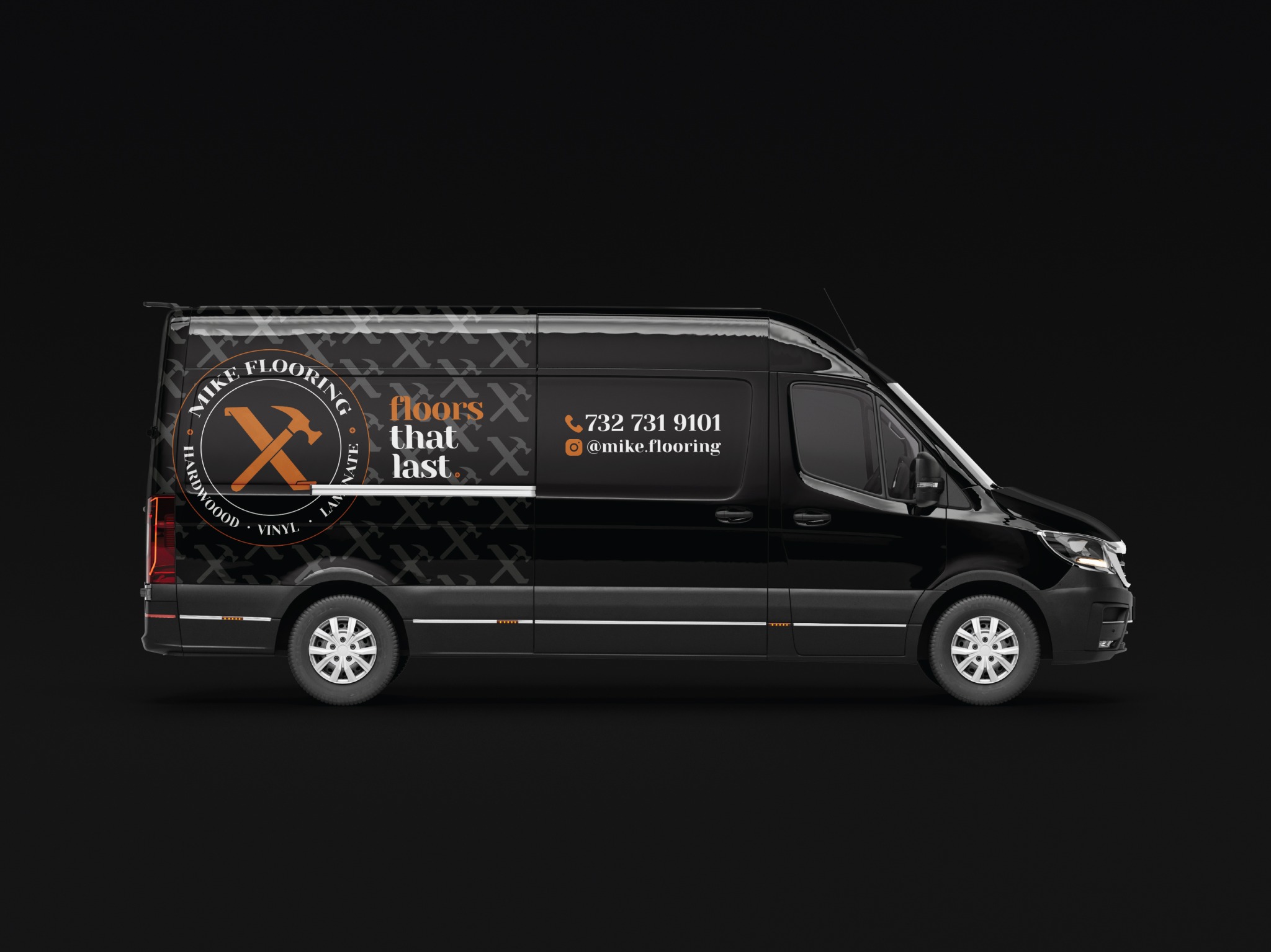 Mike Flooring identity applied to a black service vehicle