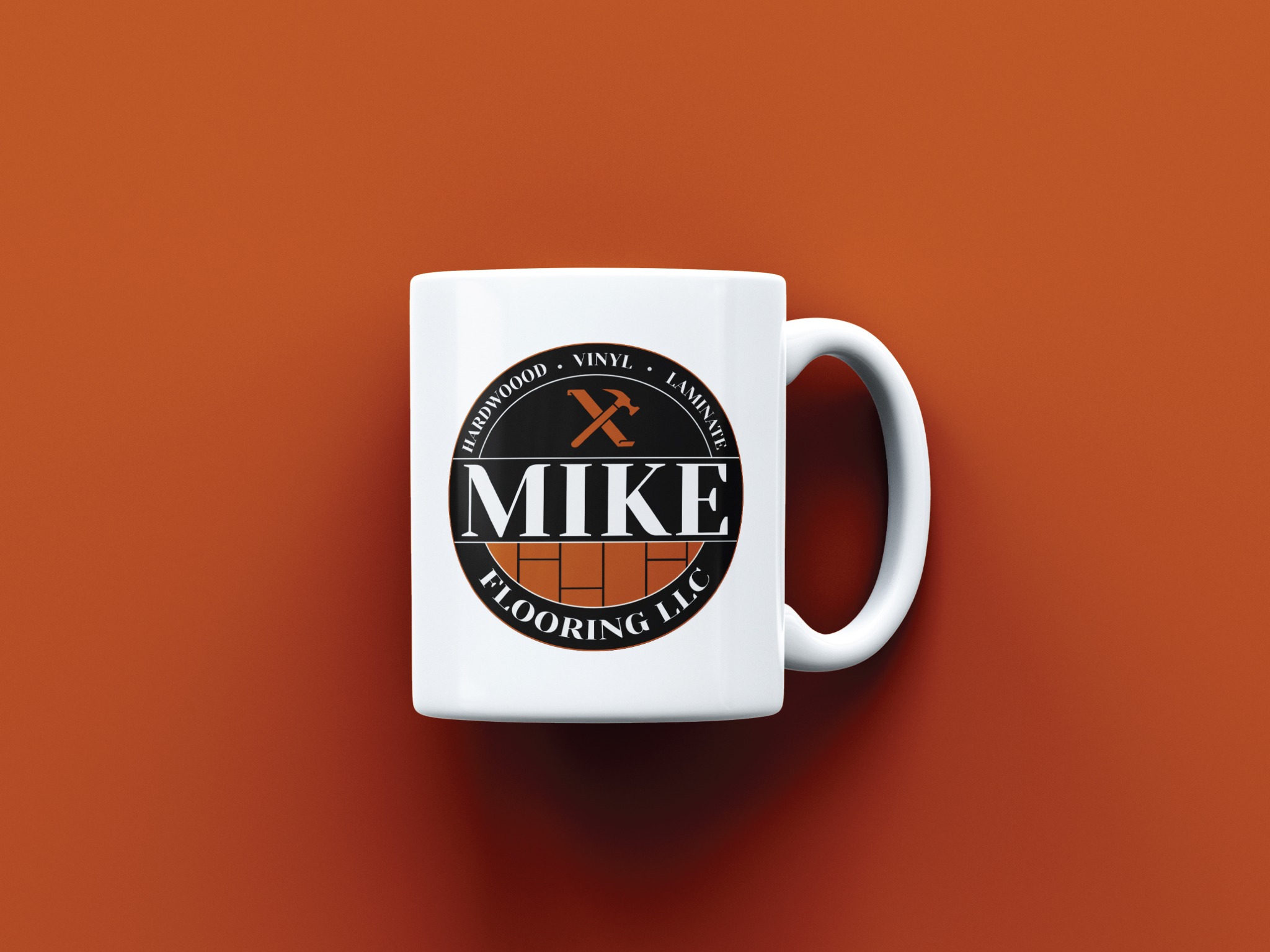 Mike Flooring brand identity applied to a white mug